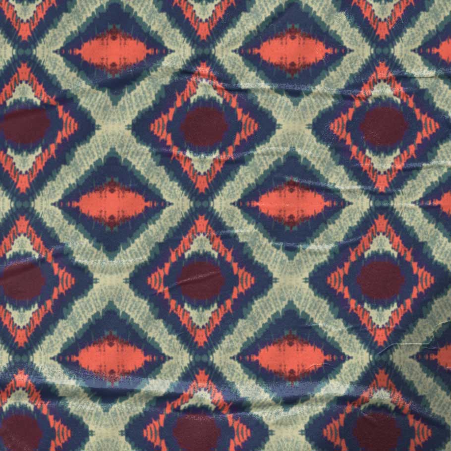 Whether as a focal point or a complementary accent, Green-Blue-Red Ikat brings a touch of exotic sophistication and artistic depth to any space, transforming it into a colorful and stylish haven.